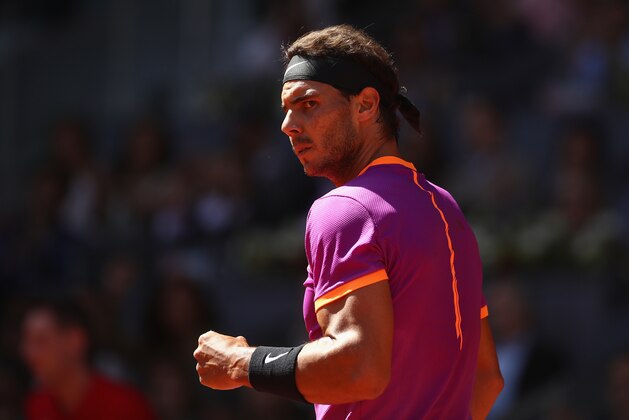 MADRID, SPAIN - MAY 13:  Rafael Nadal of Spain celebrates a point against Novak Djokovic of Serbia in the semi finals during day eight of the Mutua Madrid Open tennis at La Caja Magica on May 13, 2017 in Madrid, Spain.  (Photo by Julian Finney/Getty Images)