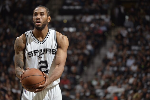 SAN ANTONIO, TX - MAY 9:  Kawhi Leonard #2 of the San Antonio Spurs shoots a free throw against the Houston Rockets in Game Five of the Western Conference Semifinals on May 9, 2017 at the AT&T Center in San Antonio, Texas. NOTE TO USER: User expressly acknowledges and agrees that, by downloading and or using this photograph, user is consenting to the terms and conditions of the Getty Images License Agreement. Mandatory Copyright Notice: Copyright 2017 NBAE (Photos by Mark Sobhani/NBAE via Getty Images)