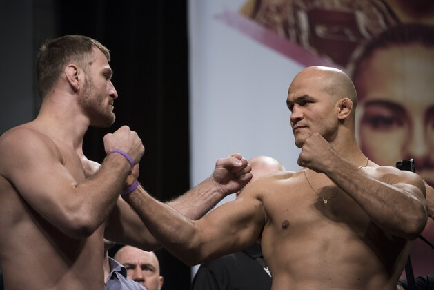 DALLAS, TX - MAY 12:  (L to R) Stipe Miocic faces off with Junior dos Santos during the UFC 211 weigh-in at the American Airlines Center on May 12, 2017 in Dallas, Texas. (Photo by Cooper Neill/Zuffa LLC/Zuffa LLC via Getty Images)