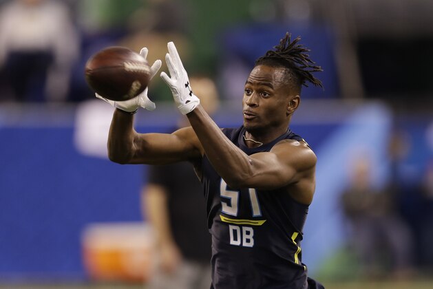 Houston defensive back Howard Wilson runs a drill at the NFL football scouting combine Monday, March 6, 2017, in Indianapolis. (AP Photo/David J. Phillip)