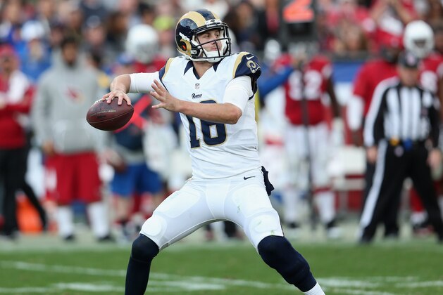 LOS ANGELES, CA - JANUARY 01:  Quarterback Jared Goff #16 of the Los Angeles Rams throws a pass against the Arizona Cardinals in the third quarter at Los Angeles Memorial Coliseum on January 1, 2017 in Los Angeles, California.  (Photo by Stephen Dunn/Getty Images)