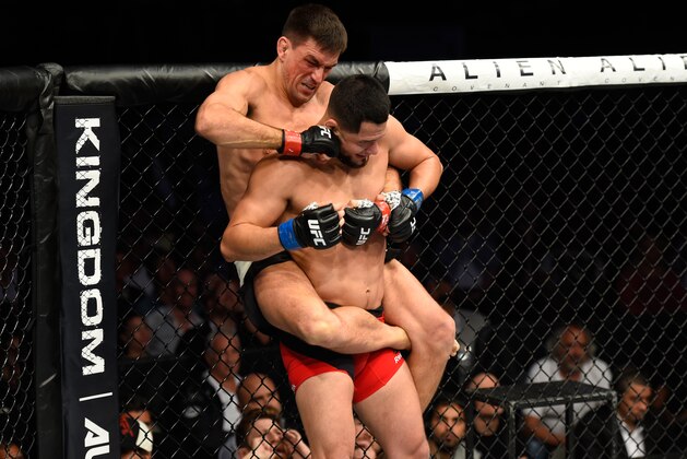 DALLAS, TX - MAY 13:  (L-R) Demian Maia punches Jorge Masvidal in their welterweight fight during the UFC 211 event at the American Airlines Center on May 13, 2017 in Dallas, Texas. (Photo by Josh Hedges/Zuffa LLC/Zuffa LLC via Getty Images)