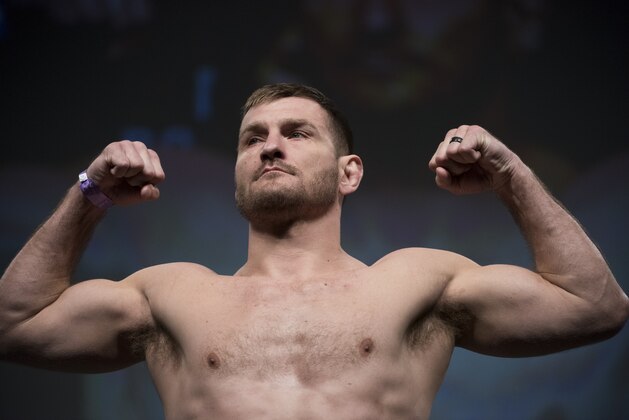 DALLAS, TX - MAY 12: Stipe Miocic poses on the scale during the UFC 211 weigh-in at the American Airlines Center on May 12, 2017 in Dallas, Texas. (Photo by Cooper Neill/Zuffa LLC/Zuffa LLC via Getty Images) DALLAS, TX - MAY 12: Stipe Miocic poses on the scale during the UFC 211 weigh-in at the American Airlines Center on May 12, 2017 in Dallas, Texas. (Photo by Cooper Neill/Zuffa LLC/Zuffa LLC via Getty Images)