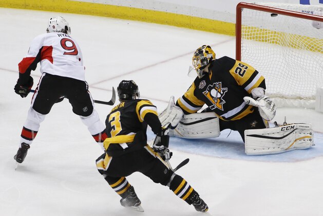 Ottawa Senators' Bobby Ryan (9) scores [ast Pittsburgh Penguins goalie Marc-Andre Fleury (29) after getting by Olli Maatta (3) during the overtime period of Game 1 of the Eastern Conference final in the NHL hockey Stanley Cup playoffs, Saturday, May 13, 2017, in Pittsburgh. Ottawa won 2-1 in overtime. (AP Photo/Gene J. Puskar)