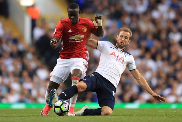 LONDON, ENGLAND - MAY 14: Harry Kane of Tottenham Hotspur tackles Eric Bailly of Manchester United during the Premier League match between Tottenham Hotspur and Manchester United at White Hart Lane on May 14, 2017 in London, England. Tottenham Hotspur are playing their last ever home match at White Hart Lane after their 112 year stay at the stadium. Spurs will play at Wembley Stadium next season with a move to a newly built stadium for the 2018-19 campaign.  (Photo by Richard Heathcote/Getty Images)