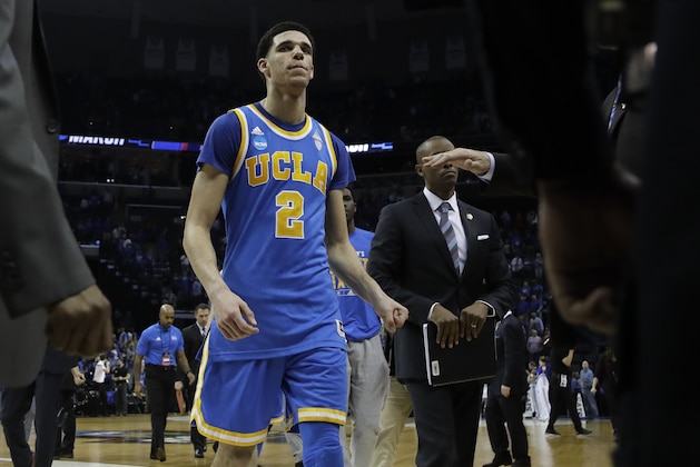 UCLA guard Lonzo Ball (2) leaves the court after UCLA lost to Kentucky in an NCAA college basketball tournament South Regional semifinal game Friday, March 24, 2017, in Memphis, Tenn. (AP Photo/Mark Humphrey)
