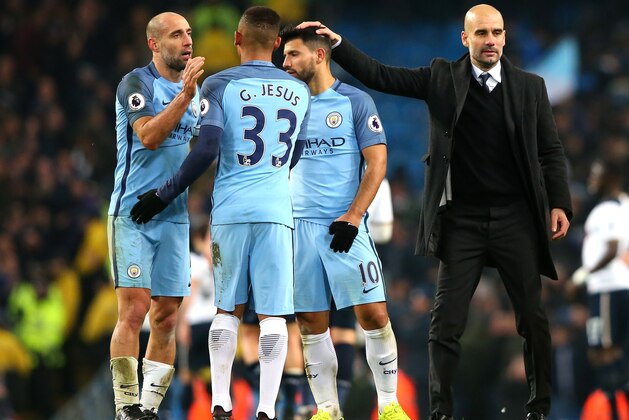 MANCHESTER, ENGLAND - JANUARY 21: Pablo Zabaleta of Manchester City (L) and Gabriel Jesus of Manchester City embrace while Josep Guardiola, Manager of Manchester City pats him on the back after the Premier League match between Manchester City and Tottenham Hotspur at the Etihad Stadium on January 21, 2017 in Manchester, England.  (Photo by Alex Livesey/Getty Images)