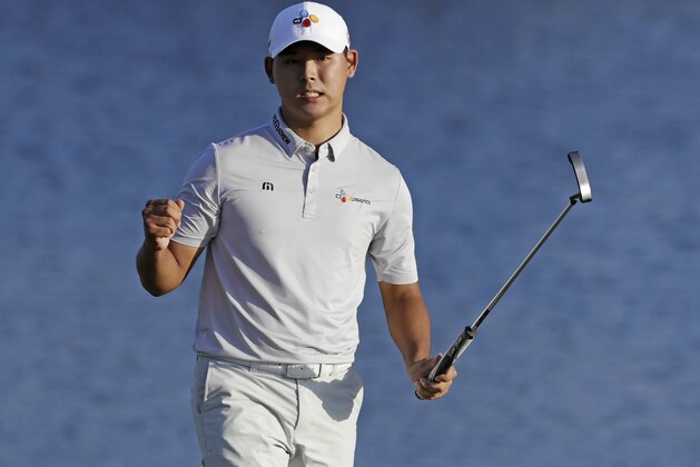Si Woo Kim, of South Korea, celebrates after winning The Players Championship golf tournament Sunday, May 14, 2017, in Ponte Vedra Beach, Fla. (AP Photo/Chris O'Meara)