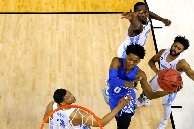 MEMPHIS, TN - MARCH 26: De'Aaron Fox #0 of the Kentucky Wildcats drives to the basket in the first half against Kennedy Meeks #3, Theo Pinson #1 and Joel Berry II #2 of the North Carolina Tar Heels during the 2017 NCAA Men's Basketball Tournament South Regional at FedExForum on March 26, 2017 in Memphis, Tennessee.  (Photo by Andy Lyons/Getty Images)