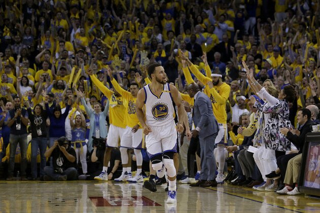 Golden State Warriors guard Stephen Curry (30) reacts after scoring against the San Antonio Spurs during the second half of Game 1 of the NBA basketball Western Conference finals in Oakland, Calif., Sunday, May 14, 2017. The Warriors won 113-111. (AP Photo/Jeff Chiu)