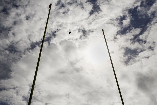 A football flies through the goalposts during warm ups before an NFL football game between the Baltimore Ravens and the Cincinnati Bengals in Baltimore, Sunday, Sept. 27, 2015. (AP Photo/Patrick Semansky)