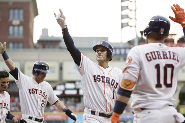 Houston Astros' Carlos Correa (1) celebrates after hitting a three-run home run against the Atlanta Braves during the first inning of a baseball game, Tuesday, May 9, 2017, in Houston. (AP Photo/David J. Phillip)