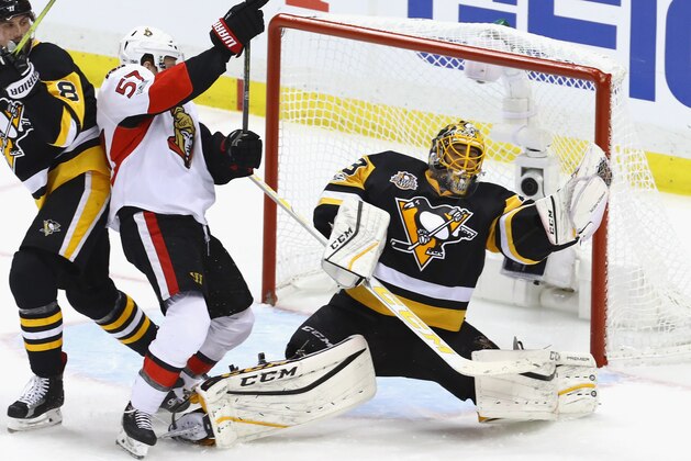 PITTSBURGH, PA - MAY 13:  Marc-Andre Fleury #29 of the Pittsburgh Penguins tends net against the Ottawa Senators in Game One of the Eastern Conference Final during the 2017 NHL Stanley Cup Playoffs at the PPG PAINTS Arena on May 13, 2017 in Pittsburgh, Pennsylvania. The Senators defeated the Penguins 2-1 in overtime.  (Photo by Bruce Bennett/Getty Images)