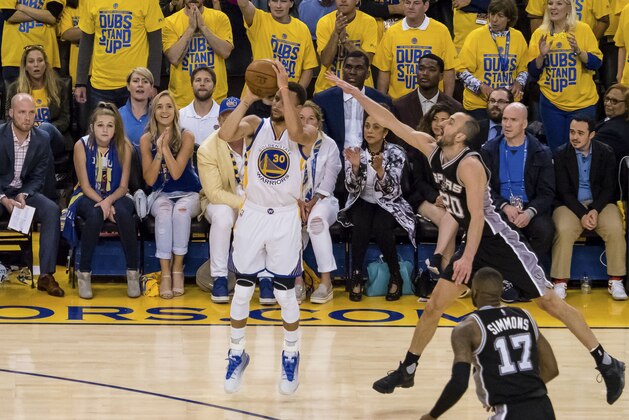 May 14, 2017; Oakland, CA, USA; Golden State Warriors guard Stephen Curry (30) scores a three point basket against San Antonio Spurs guard Manu Ginobili (20) during the fourth quarter in game one of the Western conference finals of the 2017 NBA Playoffs at Oracle Arena. Mandatory Credit: Kelley L Cox-USA TODAY Sports