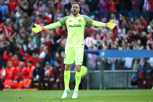 MADRID, SPAIN - MAY 10: Goalkeeper of Atletico Madrid Jan Oblak celebrates the second goal during the UEFA Champions League Semi Final second leg match between Club Atletico de Madrid and Real Madrid CF at Vicente Calderon Stadium on May 10, 2017 in Madrid, Spain. (Photo by Jean Catuffe/Getty Images,)