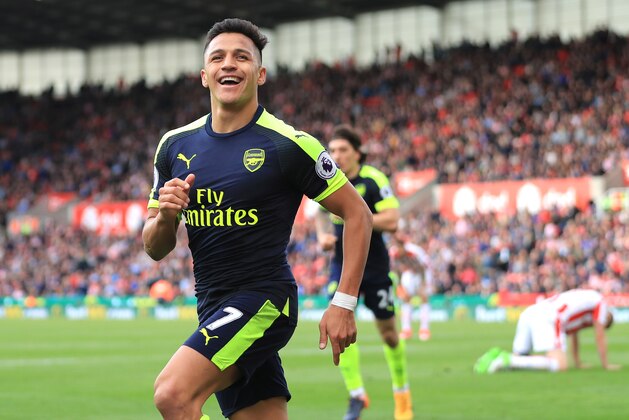 STOKE ON TRENT, ENGLAND - MAY 13:  Alexis Sanchez of Arsenal celebrates scoring his sides third goal during the Premier League match between Stoke City and Arsenal at Bet365 Stadium on May 13, 2017 in Stoke on Trent, England.  (Photo by Richard Heathcote/Getty Images)