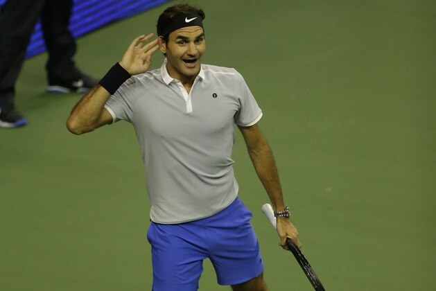 Roger Federer, of Switzerland, plays in an exhibition tennis match against John Isner, Saturday, April 29, 2017, in Seattle. The Match for Africa 4 was held to raise money for the Roger Federer Foundation, which supports education programs for children living in poverty in Africa and Switzerland. (AP Photo/Ted S. Warren)