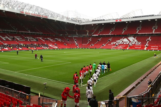 MANCHESTER, ENGLAND - MAY 15:  Players enter the field of play during the Premier League 2 match between Manchester United and Tottenham Hotspur at Old Trafford on May 15, 2017 in Manchester, England.  (Photo by Jan Kruger/Getty Images)