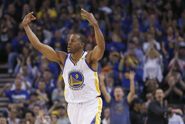 FILE - In this April 4, 2017, file photo, Golden State Warriors forward Andre Iguodala celebrates a 3-point shot against the Minnesota Timberwolves during the first half of an NBA basketball game in Oakland, Calif. Iguodala is part of