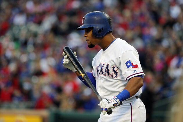 Texas Rangers' Carlos Gomez prepares for an at-bat against the Kansas City Royals in a baseball game in Arlington, Texas, Saturday, April 22, 2017. (AP Photo/Tony Gutierrez)