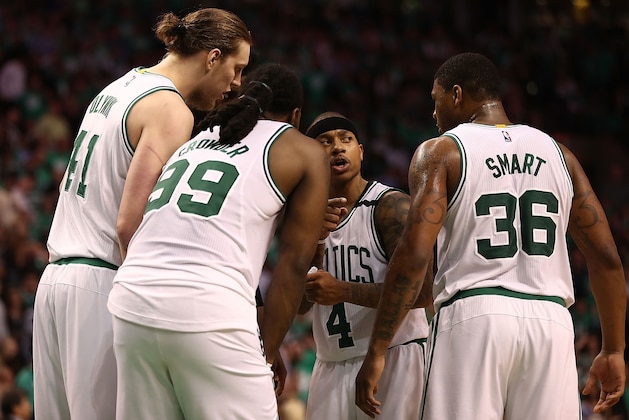 BOSTON, MA - MAY 15:  Kelly Olynyk #41, Jae Crowder #99, Isaiah Thomas #4 and Marcus Smart #36 of the Boston Celtics huddle against the Washington Wizards during Game Seven of the NBA Eastern Conference Semi-Finals at TD Garden on May 15, 2017 in Boston, Massachusetts.  NOTE TO USER: User expressly acknowledges and agrees that, by downloading and or using this photograph, User is consenting to the terms and conditions of the Getty Images License Agreement.  (Photo by Elsa/Getty Images)
