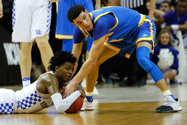 MEMPHIS, TN - MARCH 24: De'Aaron Fox #0 of the Kentucky Wildcats and Lonzo Ball #2 of the UCLA Bruins compete for a lose ball in the second half during the 2017 NCAA Men's Basketball Tournament South Regional at FedExForum on March 24, 2017 in Memphis, Tennessee.  (Photo by Kevin C. Cox/Getty Images)
