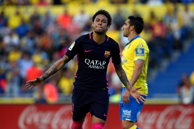LAS PALMAS, SPAIN - MAY 14: Neymar of Barcelona celebrates after scoring his second goal and the teams third of the game during the La Liga match between UD Las Palmas and Barcelona at Estadio de Gran Canaria on May 14, 2017 in Las Palmas, Spain. (Photo by Charlie Crowhurst/Getty Images)