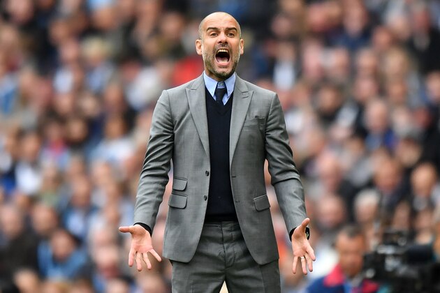 Manchester City's Spanish manager Pep Guardiola gestures on the touchline during the English Premier League football match between Manchester City and Leicester City at the Etihad Stadium in Manchester, north west England, on May 13, 2017.
Manchester City won the game 2-1. / AFP PHOTO / Anthony DEVLIN / RESTRICTED TO EDITORIAL USE. No use with unauthorized audio, video, data, fixture lists, club/league logos or 'live' services. Online in-match use limited to 75 images, no video emulation. No use in betting, games or single club/league/player publications.  /         (Photo credit should read ANTHONY DEVLIN/AFP/Getty Images)