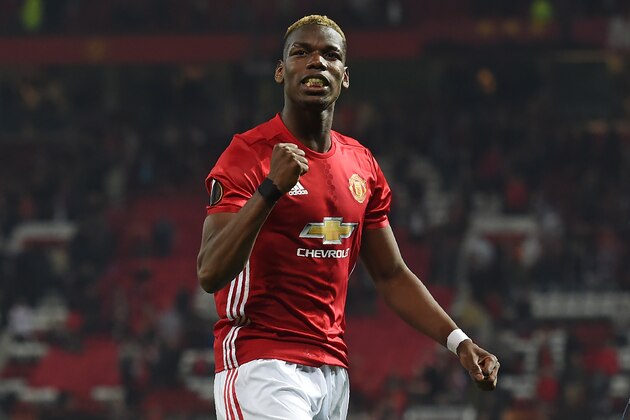 Manchester United's French midfielder Paul Pogba celebrates after the UEFA Europa League semi-final, second-leg football match between Manchester United and Celta Vigo at Old Trafford stadium in Manchester, north-west England, on May 11, 2017.
Manchester United won through to the final after the game ended 1-1, United winning 2-1 on aggregate. / AFP PHOTO / PAUL ELLIS        (Photo credit should read PAUL ELLIS/AFP/Getty Images)