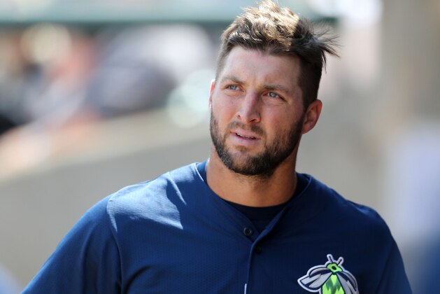 LAKEWOOD, NJ - MAY 14:  Tim Tebow #15 of the Columbia Fireflies looks on from the dugout after striking out in the top of the sixth inning against the Lakewood BlueClaws on May 14, 2017 at FirstEnergy Park in Lakewood, New Jersey. (Photo by Christopher Pasatieri/Getty Images)