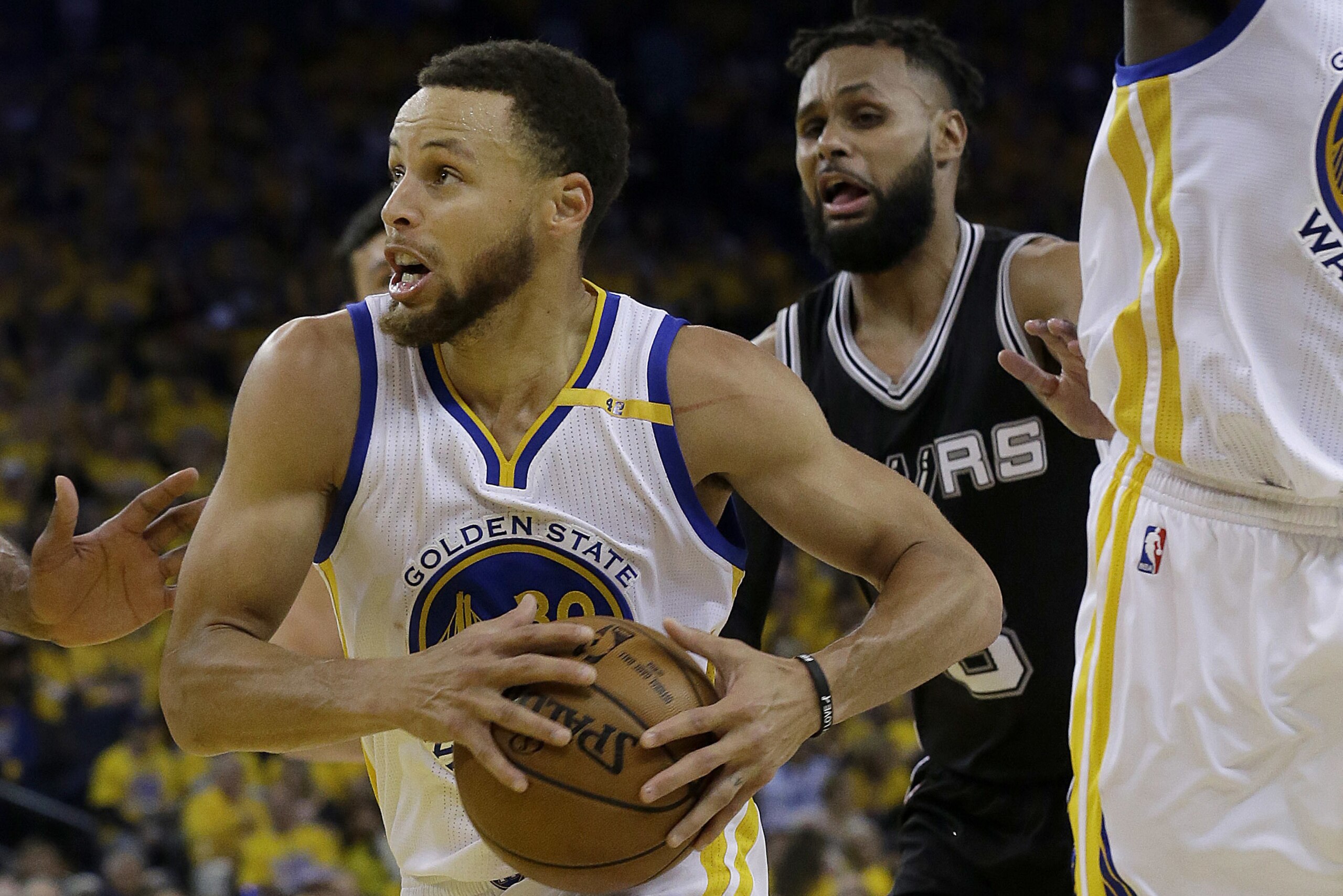 Golden State Warriors guard Stephen Curry drives against the San Antonio Spurs during the first half of Game 1 of the NBA basketball Western Conference finals in Oakland, Calif., Sunday, May 14, 2017. (AP Photo/Jeff Chiu)