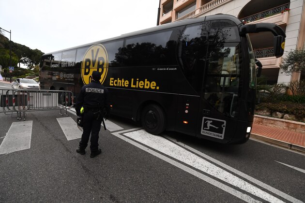 The bus transporting Dortmund's players arrives under poice escort
at the Louis II stadium prior to the UEFA Champions League football match Monaco vs Dortmund on April 19 in Monaco.  / AFP PHOTO / boris HORVAT        (Photo credit should read BORIS HORVAT/AFP/Getty Images)