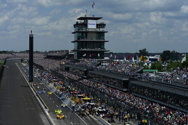 INDIANAPOLIS, IN - MAY 29:  James Hinchcliffe of Canada driver of the #5 Schmidt Peterson Motorsports Honda leads the field into the pits during the 100th running of the Indianapolis 500 mile race at the Indianapolis Motor Speedway on May 29, 2016 in Indianapolis, Indiana.  (Photo by Robert Laberge/Getty Images)