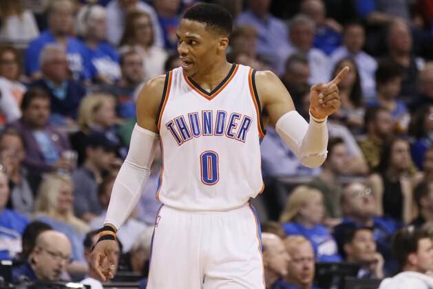 Oklahoma City Thunder guard Russell Westbrook (0) gestures to an official during an NBA basketball game against the San Antonio Spurs in Oklahoma City, Friday, March 31, 2017. San Antonio won 100-95. (AP Photo/Sue Ogrocki)