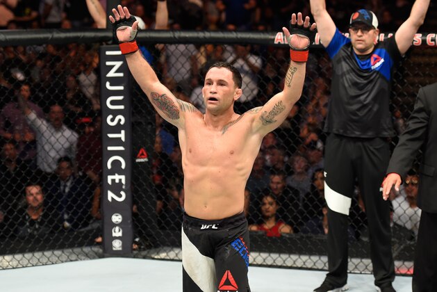 DALLAS, TX - MAY 13:  Frankie Edgar celebrates his victory over Yair Rodriguez in their featherweight fight during the UFC 211 event at the American Airlines Center on May 13, 2017 in Dallas, Texas. (Photo by Josh Hedges/Zuffa LLC/Zuffa LLC via Getty Images)