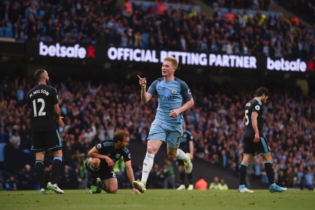 Manchester City's Belgian midfielder Kevin De Bruyne celebrates scoring their second goal during the English Premier League football match between Manchester City and West Bromwich Albion at the Etihad Stadium in Manchester, north west England, on May 16, 2017. / AFP PHOTO / PAUL ELLIS / RESTRICTED TO EDITORIAL USE. No use with unauthorized audio, video, data, fixture lists, club/league logos or 'live' services. Online in-match use limited to 75 images, no video emulation. No use in betting, games or single club/league/player publications.  /         (Photo credit should read PAUL ELLIS/AFP/Getty Images)