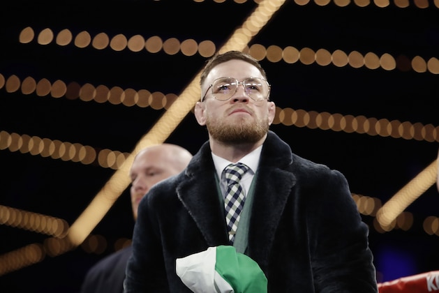 Conor McGregor, of Ireland, stands in the ring before a super bantamweight boxing match between Michael Conlan, of Ireland, and Tim Ibarra on Friday, March 17, 2017, in New York. Conlan stopped Ibarra in the third round. (AP Photo/Frank Franklin II)
