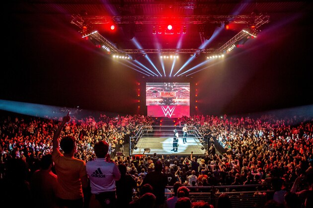 Roman and Seth celebrate in the ring during the WWE show at Zenith Arena on may 09, 2017 in Lille, France. / AFP PHOTO / PHILIPPE HUGUEN        (Photo credit should read PHILIPPE HUGUEN/AFP/Getty Images)