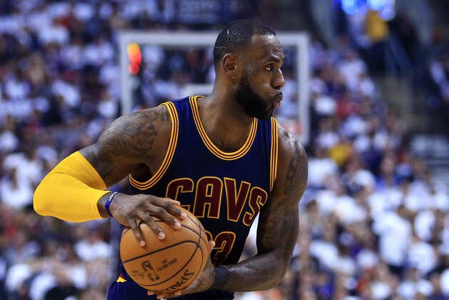 TORONTO, ON - MAY 07:  Lebron James #23 of the Cleveland Cavaliers dribbles the ball as in the first half of Game Four of the Eastern Conference Semifinals against the Toronto Raptors during the 2017 NBA Playoffs at Air Canada Centre on May 7, 2017 in Toronto, Canada.  NOTE TO USER: User expressly acknowledges and agrees that, by downloading and or using this photograph, User is consenting to the terms and conditions of the Getty Images License Agreement.  (Photo by Vaughn Ridley/Getty Images)