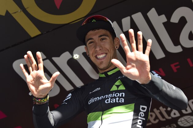 Spain's Omar Fraile of team Dimension Data celebrates on the podium after winning the 11th stage of the 100th Giro d'Italia, Tour of Italy, cycling race from Florence to Bagno di Romagna on May 17, 2017. 
Race leader Tom Dumoulin, of Sunweb, retained the pink jersey after a 161 km ride from Florence to Bagno di Romagna to maintain his overall lead of 2min 23sec on 2014 champion Nairo Quintana (Movistar).
 / AFP PHOTO / Luk BENIES        (Photo credit should read LUK BENIES/AFP/Getty Images)