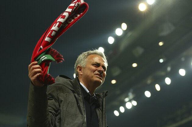 Manchester United's manager Jose Mourinho celebrates after the end of the Europa League semifinal second leg soccer match between Manchester United and Celta Vigo at Old Trafford in Manchester, England, Thursday, May 11, 2017. Manchester United drew the match but go through to the final 2-1. (AP Photo/Dave Thompson)