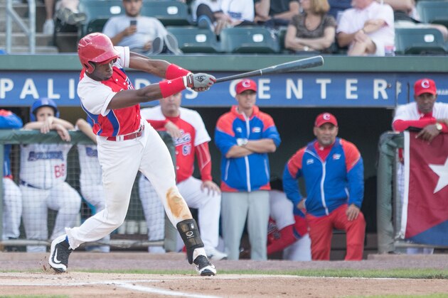 POMONA, NY - JUNE 24: Luis Robert Moiran of the Cuban National Team takes a turn at bat against the Rockland Boulders at Palisades Credit Union Park on June 24, 2016 in Pomona, New York. The Cubans won, 6-1. (Photo by Charles Norfleet/Getty Images)