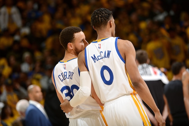 OAKLAND, CA - MAY 16: Stephen Curry #30 talks with Patrick McCaw #0 of the Golden State Warriors during the game against the San Antonio Spurs during Game Two of the Western Conference Finals of the 2017 NBA Playoffs on May 16, 2017 at ORACLE Arena in Oakland, California. NOTE TO USER: User expressly acknowledges and agrees that, by downloading and or using this photograph, user is consenting to the terms and conditions of Getty Images License Agreement. Mandatory Copyright Notice: Copyright 2017 NBAE (Photo by Noah Graham/NBAE via Getty Images)
