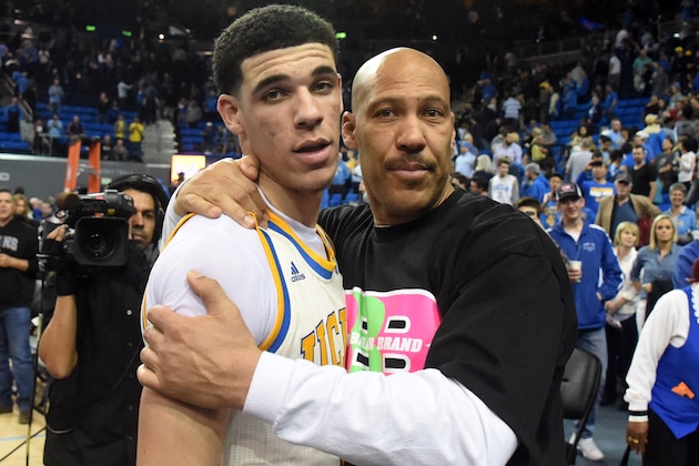 Mar 4, 2017; Los Angeles, CA, USA; Lavar Ball embraces his son UCLA Bruins guard Lonzo Ball (2) after the game against the Washington State Cougars at Pauley Pavilion. Mandatory Credit: Richard Mackson-USA TODAY Sports