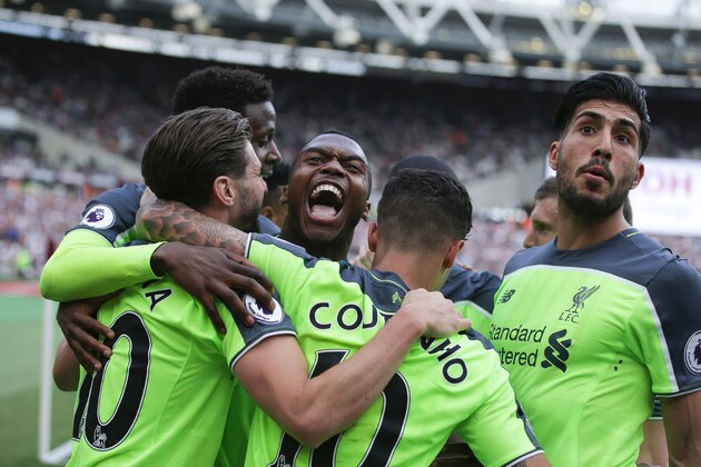Liverpool's English striker Daniel Sturridge (C) joins the celerbation after Liverpool's Brazilian midfielder Philippe Coutinho (2R) scored their second goal during the English Premier League football match between West Ham United and Liverpool at The London Stadium, in east London on May 14, 2017. / AFP PHOTO / Daniel LEAL-OLIVAS / RESTRICTED TO EDITORIAL USE. No use with unauthorized audio, video, data, fixture lists, club/league logos or 'live' services. Online in-match use limited to 75 images, no video emulation. No use in betting, games or single club/league/player publications.  /         (Photo credit should read DANIEL LEAL-OLIVAS/AFP/Getty Images)