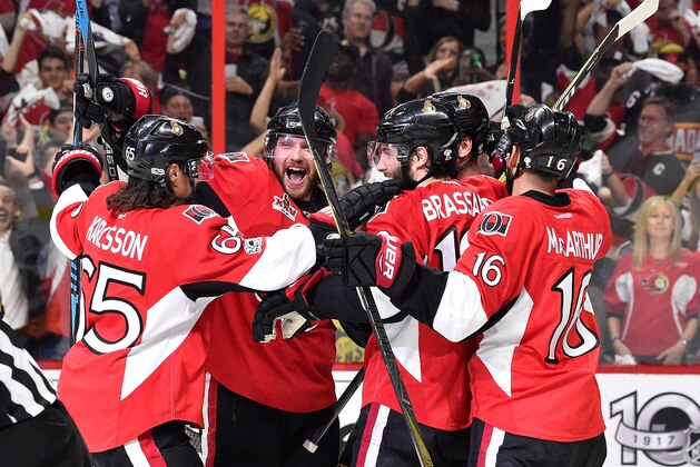 OTTAWA, ON - MAY 17:  Marc Methot #3 of the Ottawa Senators celebrates with his teammates after scoring a goal against Marc-Andre Fleury #29 of the Pittsburgh Penguins during the first period in Game Three of the Eastern Conference Final during the 2017 NHL Stanley Cup Playoffs at Canadian Tire Centre on May 17, 2017 in Ottawa, Canada.  (Photo by Minas Panagiotakis/Getty Images)