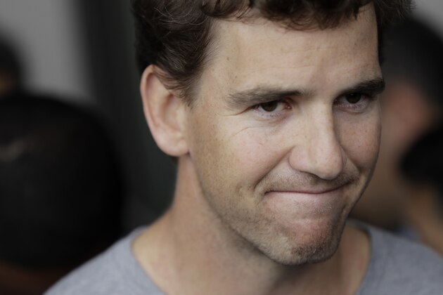 New York Giants quarterback Eli Manning talks to reporters during availability ahead of the NFL Football draft, Thursday, April 20, 2017, in East Rutherford, N.J. (AP Photo/Julio Cortez)