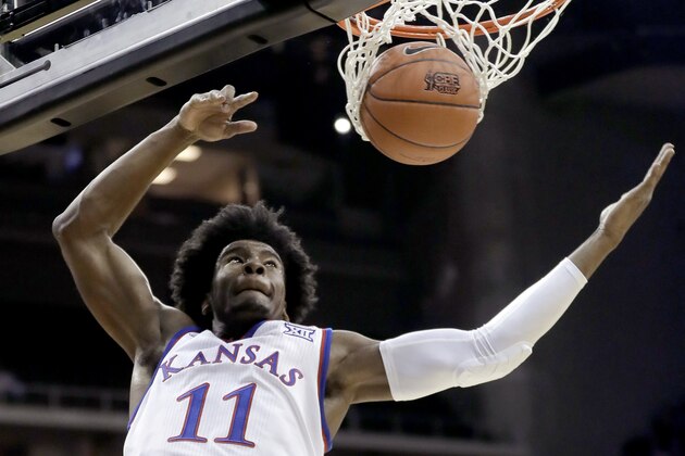 Kansas' Josh Jackson dunks during the first half of an NCAA college basketball game against UAB, Monday, Nov. 21, 2016, in Kansas City, Mo. (AP Photo/Charlie Riedel)