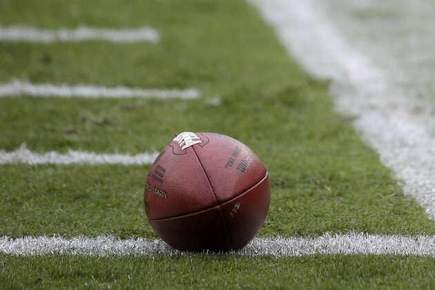 A football is shown next to a Salute to Service symbol on an end zone pylon before an NFL football game between the San Francisco 49ers and the Atlanta Falcons in Santa Clara, Calif., Sunday, Nov. 8, 2015. (AP Photo/Marcio Jose Sanchez)