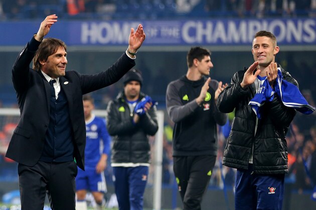LONDON, ENGLAND - MAY 15: Gary Cahill of Chelsea watches as Antonio Conte manager / head coach of Chelsea celebrates during the Premier League match between Chelsea and Watford at Stamford Bridge on May 15, 2017 in London, England. (Photo by Catherine Ivill - AMA/Getty Images)